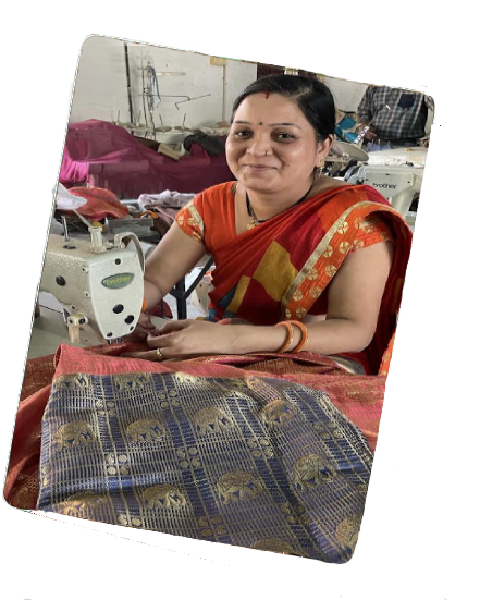 Woman working at Maha shakti seva kendra stiching unit